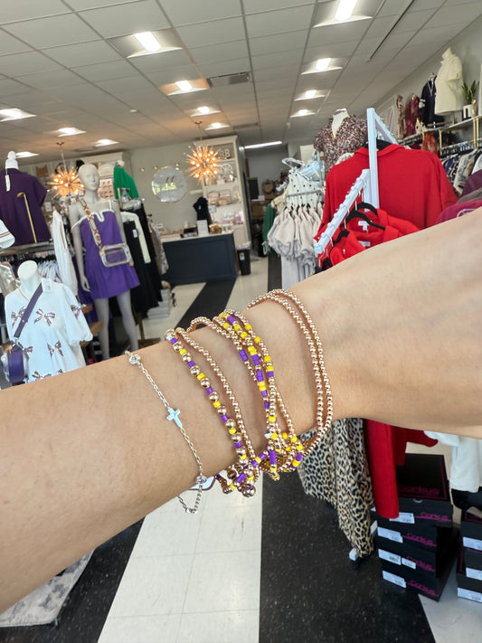 Set of 9 Purple/Gold Stretch Bracelets