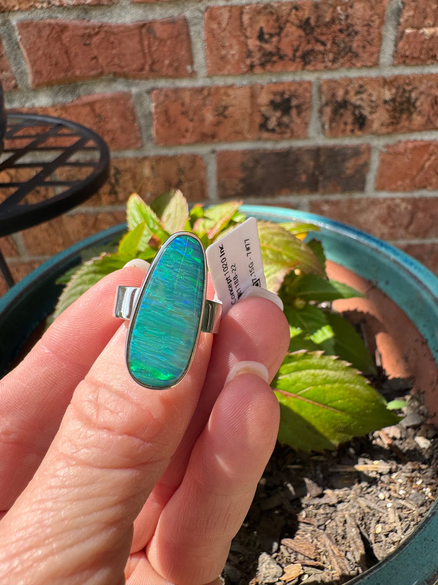 Sterling silver long oval lab opal ring