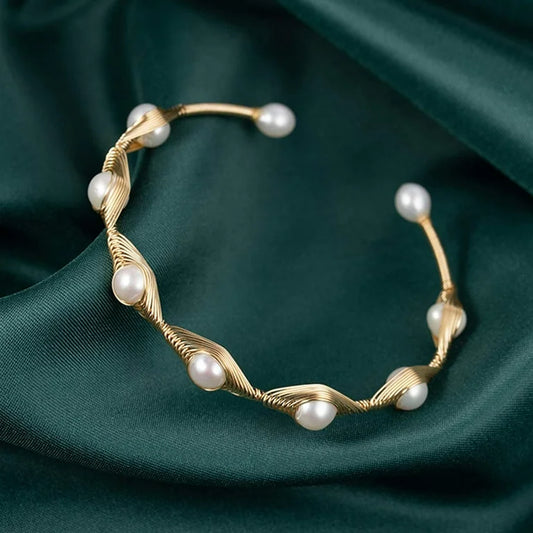 Gold wire wrapped 7 pearl bangle