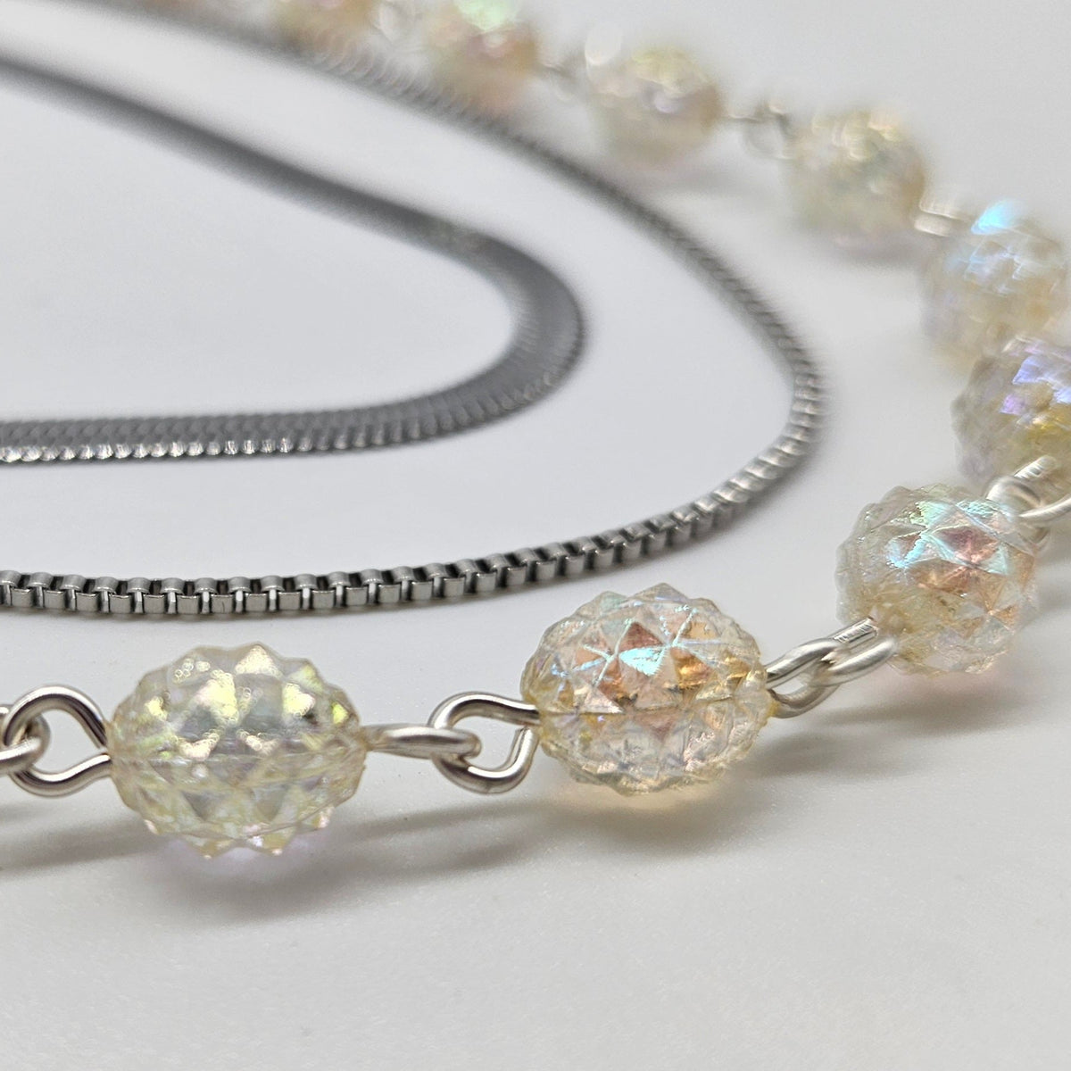 Necklace with lucite beads on a white background