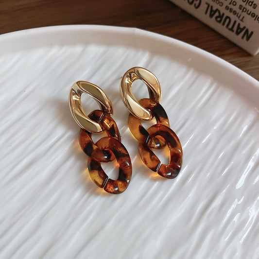 Interlocking oval tort/gold earrings