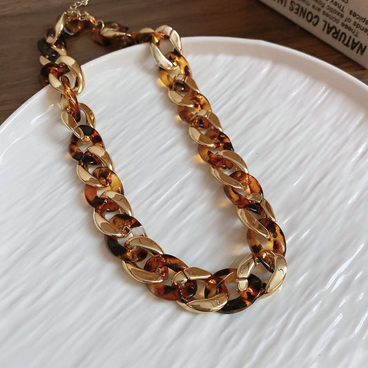Interlocking oval gold/tort necklace