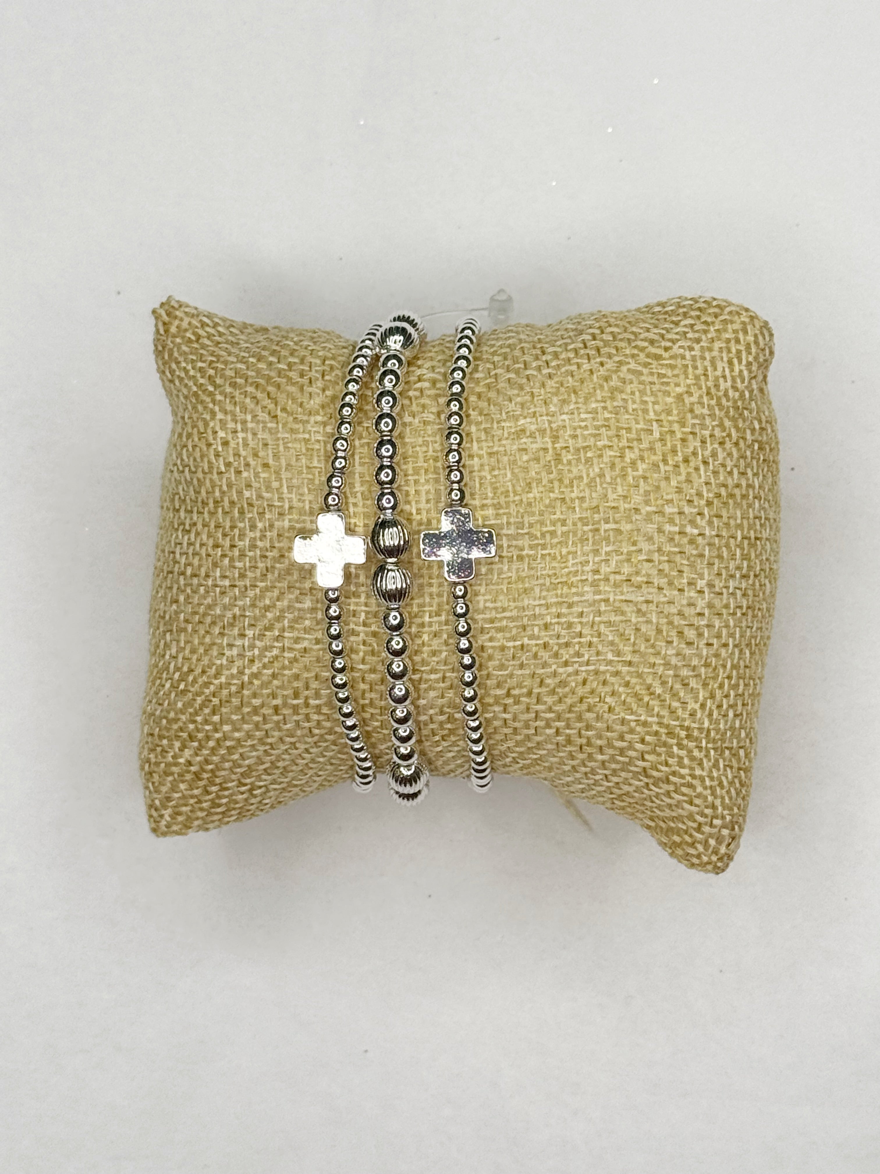 Set of 3 pearl cross bracelets