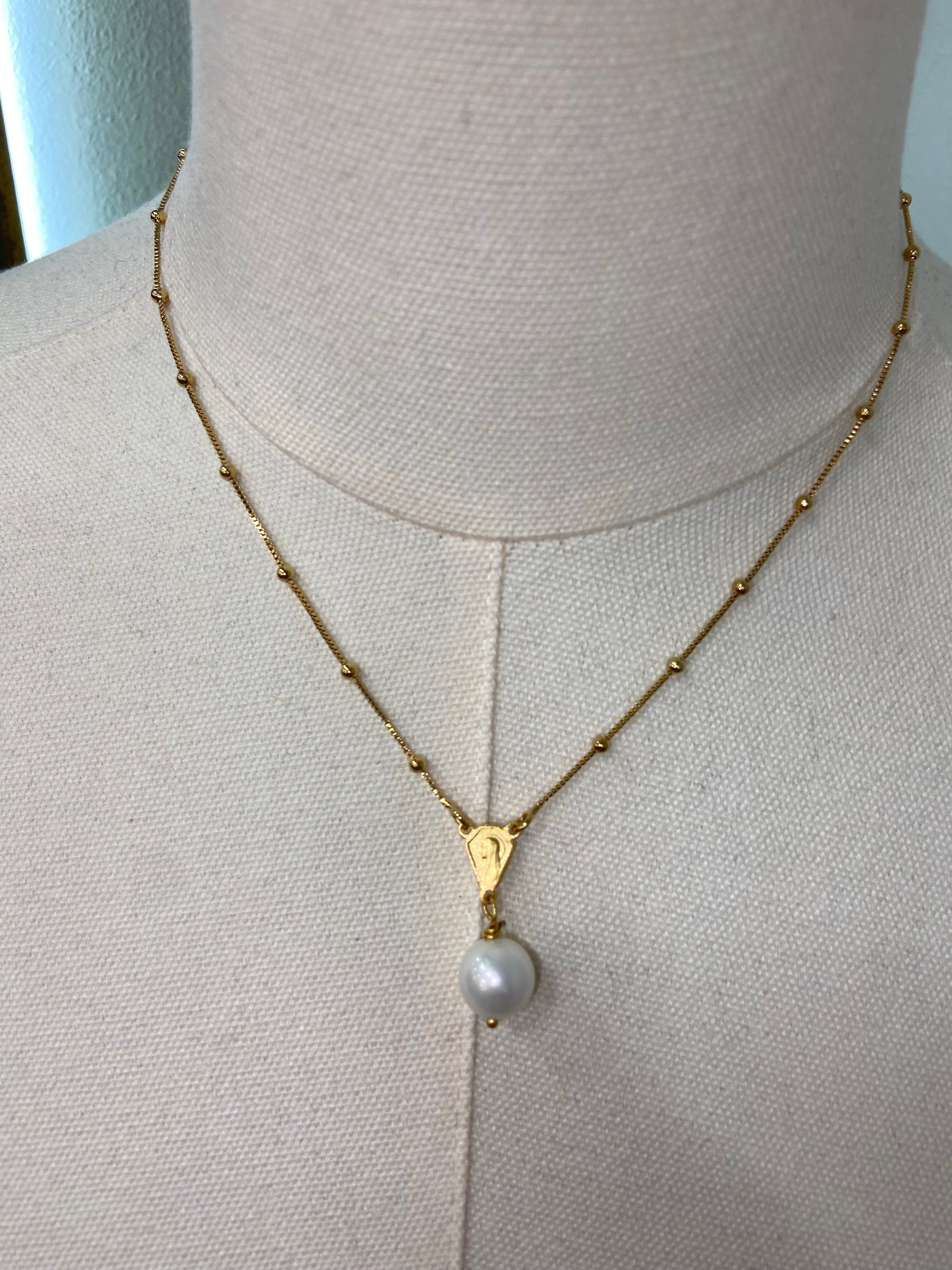 WD Tiny Mary With Pearl Necklace
