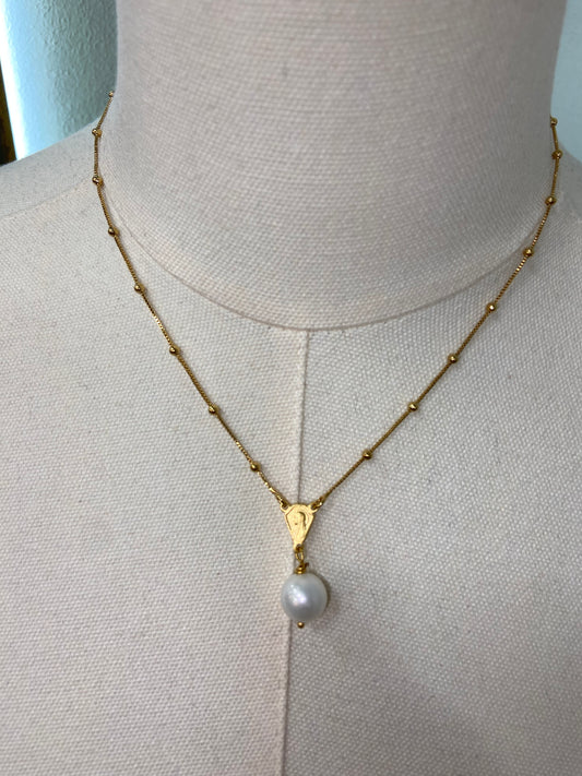 WD Tiny Mary With Pearl Necklace