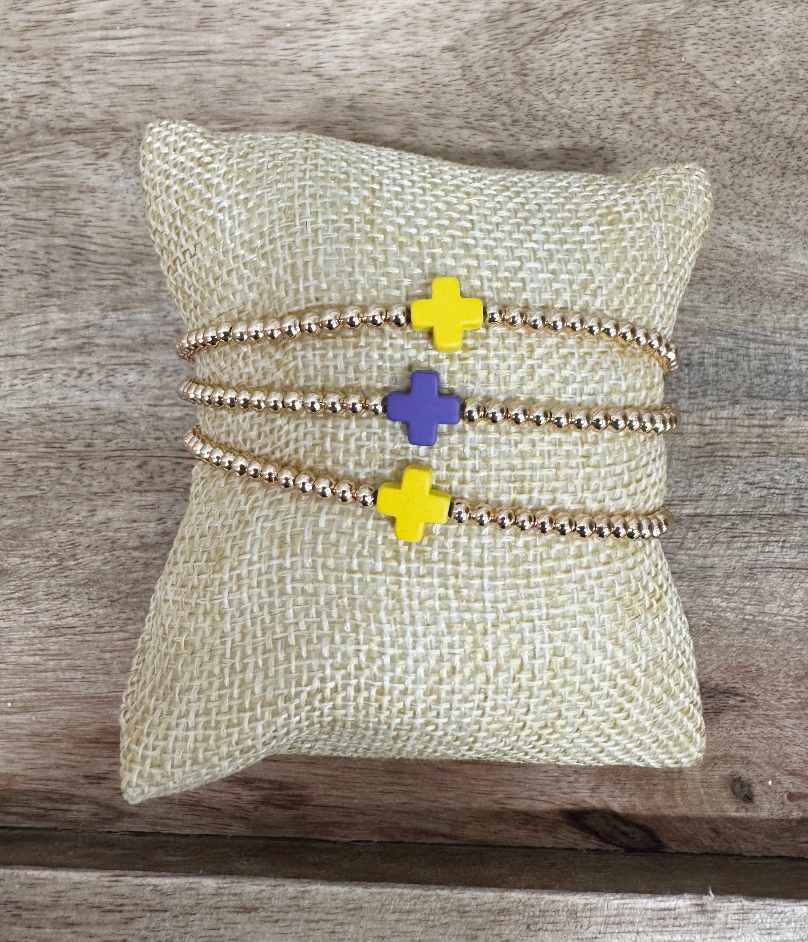 Set of 3 purple/gold bracelets