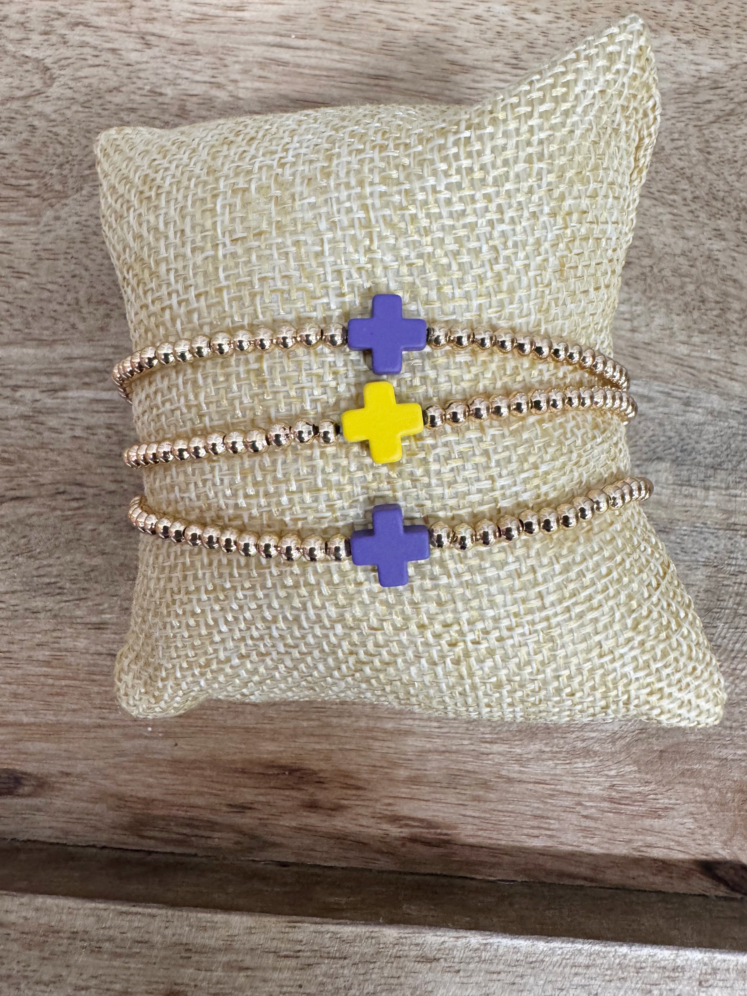 Set of 3 purple/gold bracelets