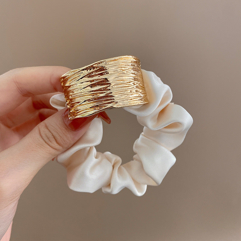 Solid metal accent hair tie