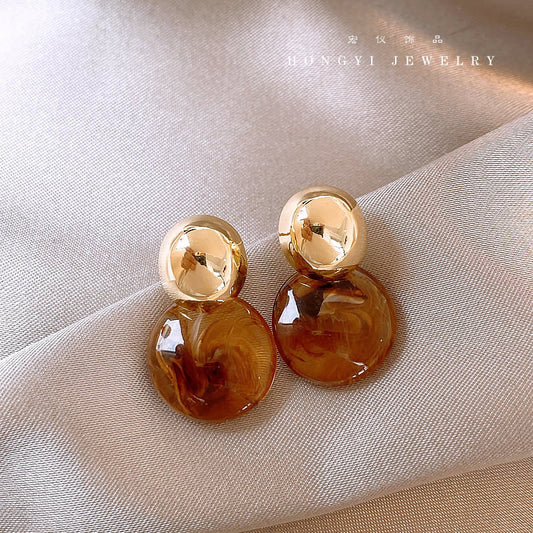 Blooming round tortoise earrings