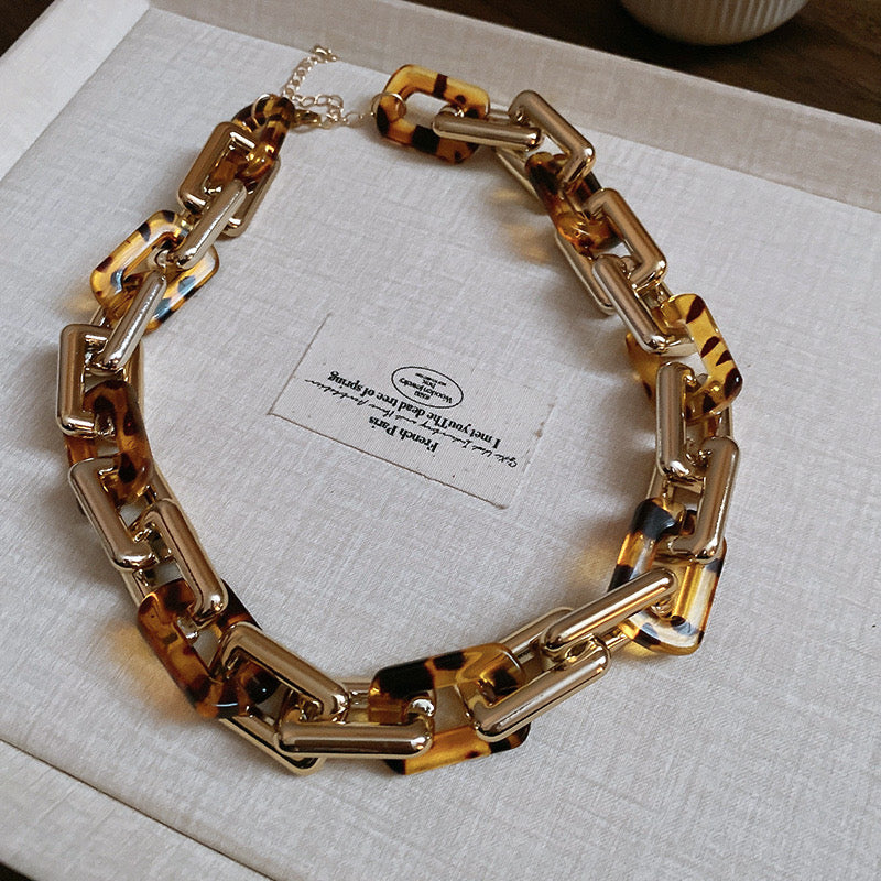 Interlocking gold/tort rectangular necklace
