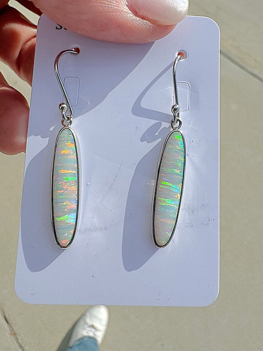 Long oval lab opal earrings