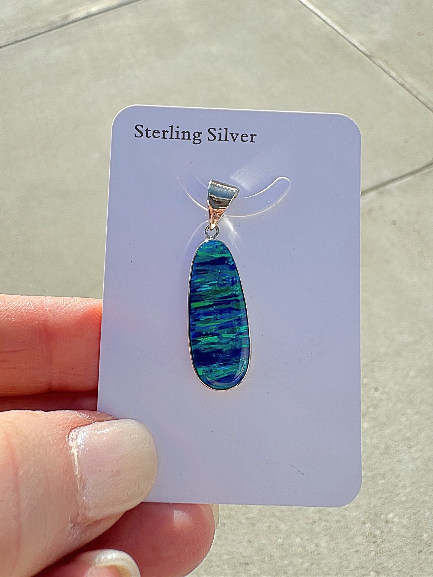 Medium oval lab opal pendant necklace