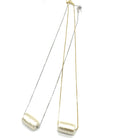 Two necklaces with gold and silver chains on a white background