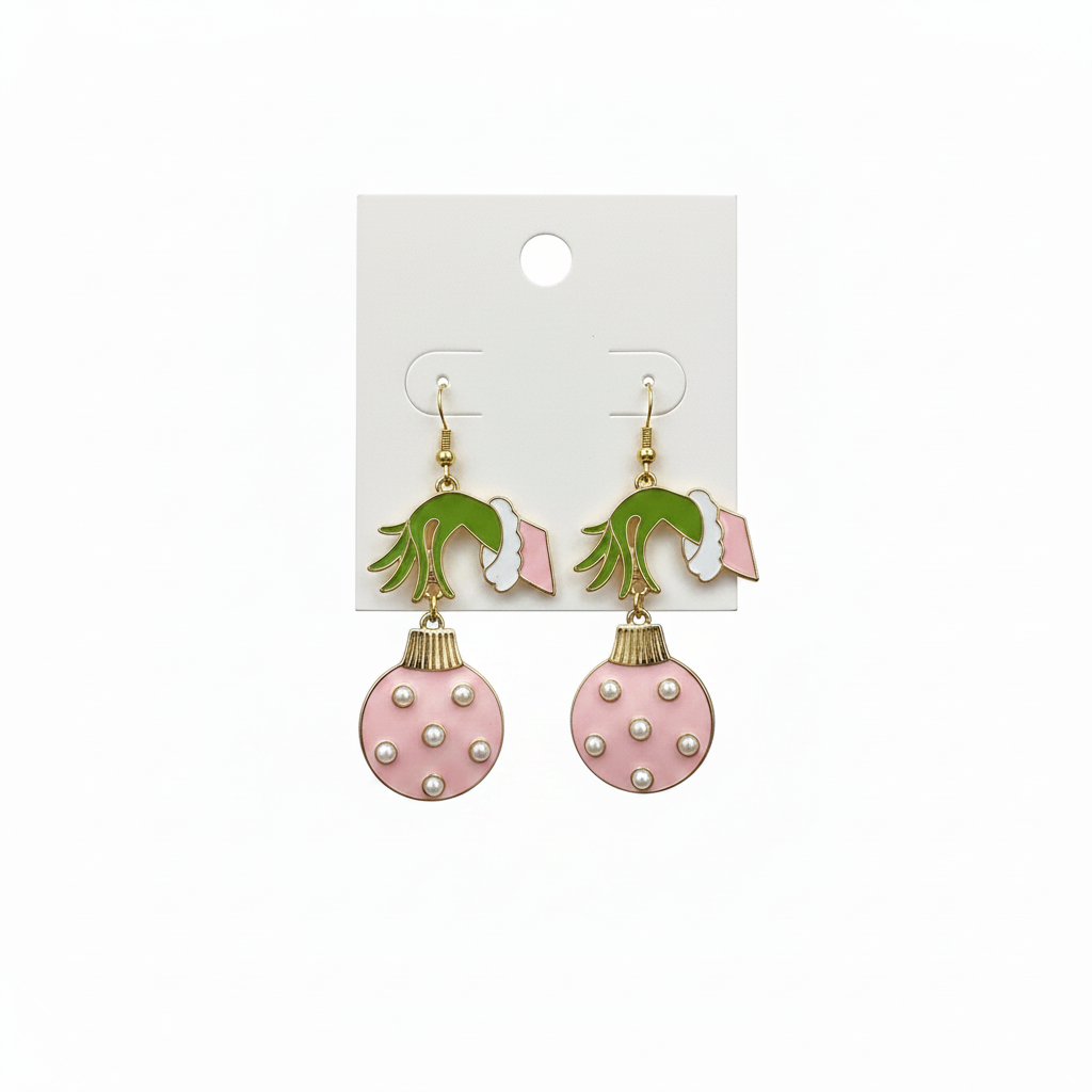 Light pink Christmas ornament dangle earrings with pearl accents on white background