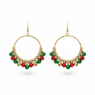 Christmas jingle bell hoop earrings with red, green, and gold bells on white background